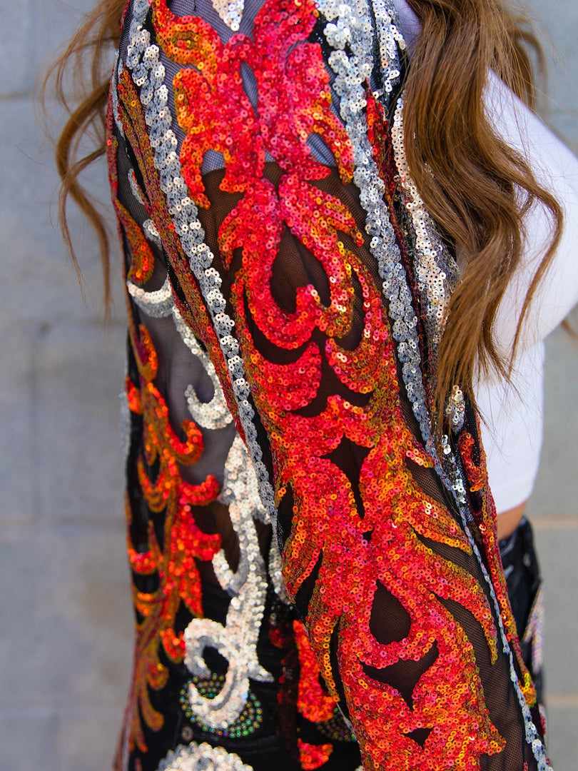 Red sequin long sleeve ankle length cardigan.